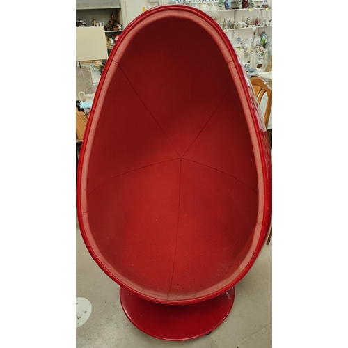 905 - After Henrik Thor Larsen, a mid 20th century swivel 'Egg Chair' in red