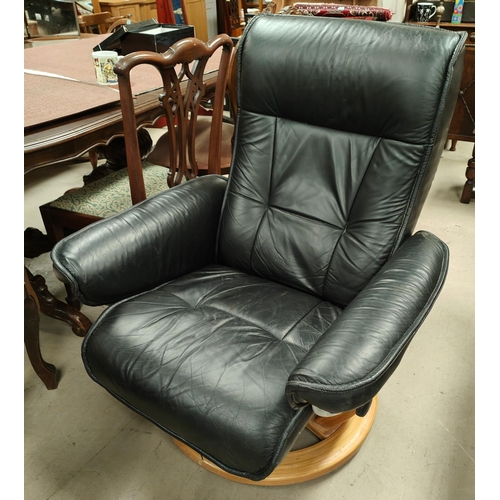 906 - A modern Scandinavian style leather easy chair in black