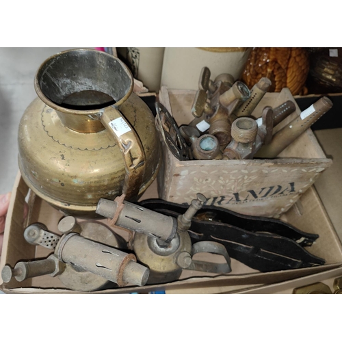 16 - Two  brass blow lamps; a selection of brass beer barrel taps; horse brasses; etc.