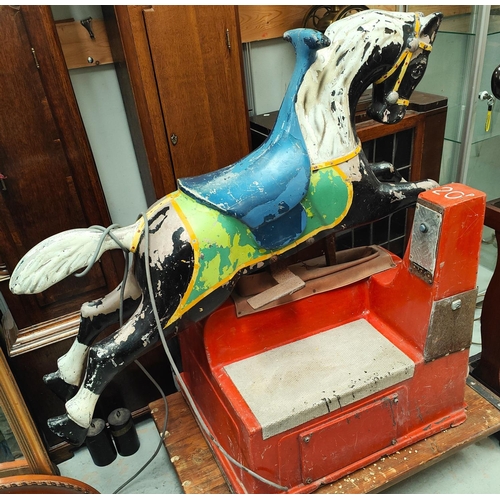 103A - An early/mid 20th century amusement arcade galloping horse; Length 130cm