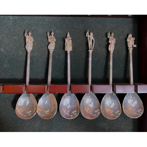 605 - A set of 6 hallmarked silver commemorative anointing spoons with figural terminals, London, various ... 