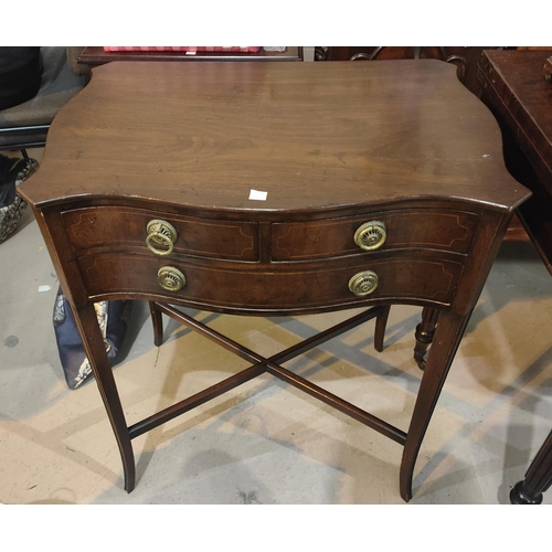 739 - A mahogany 3 drawer occasional table with shaped top, on turned splay legs