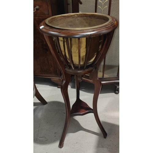 746 - An Edwardian mahogany planter with brass bowl; a wall hanging 3 height whatnot