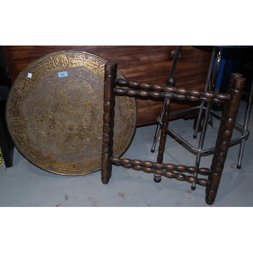 896 - An oriental circular brass top occasional table