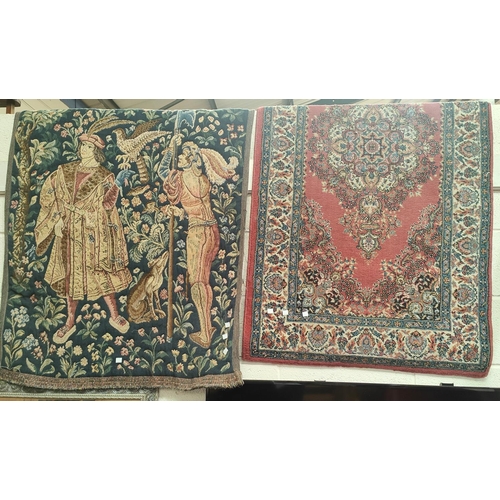 915 - A small hand knotted Persian rug; a Persian pattern rug; a wall hanging tapestry panel.