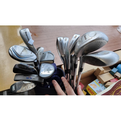 51 - A selection of golf clubs some in bags including Dunnay, Wilson etc; two golf bags containing Dunlop... 