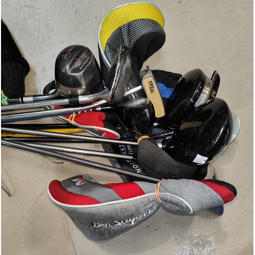41 - A selection of modern golf clubs.
