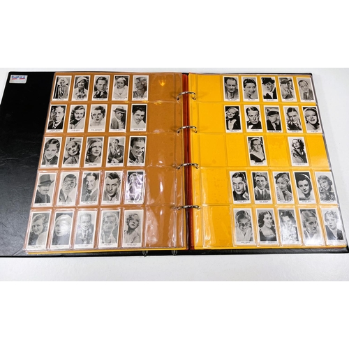 163 - A large album of film star cigarette cards:  Tobacco house 1-60; Film Favourites Purus 1-25, Co... 