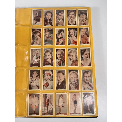 164 - A large album of film star cigarette cards:  Continental 220 set Bulgaria Stern Alben; Fry &... 