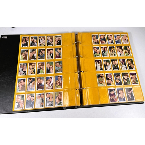 164 - A large album of film star cigarette cards:  Continental 220 set Bulgaria Stern Alben; Fry &... 