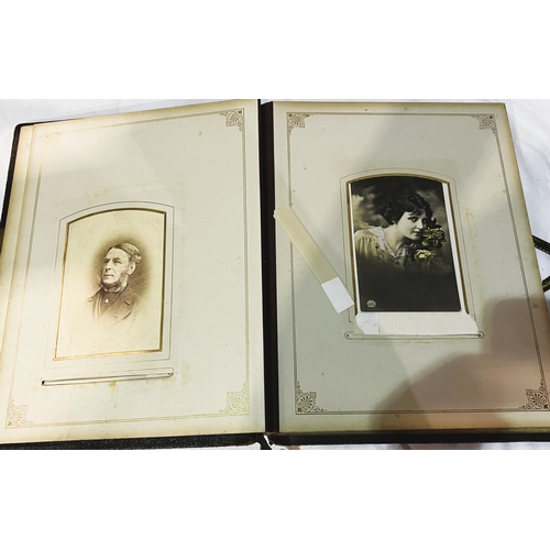 22 - A Victorian leather photo album (spine a.f.)