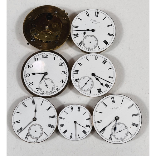 Seven vintage pocket watch movements.