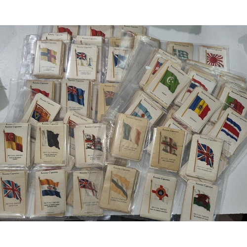 142 - A very large collection of Kensington cigarette silks:  flags; countries; British empire