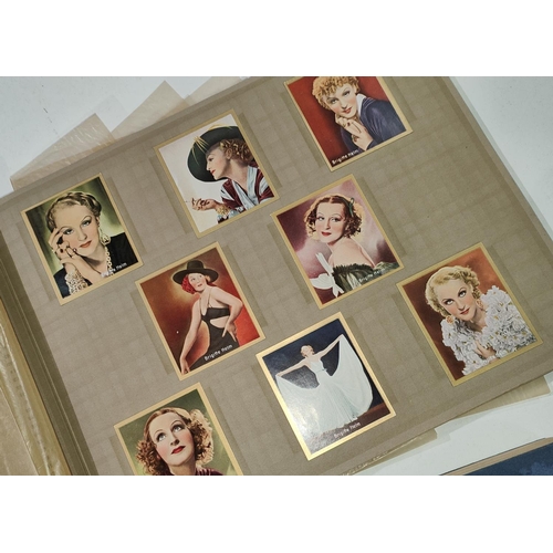 144 - Four 1930's German cigarette card albums of film stars:  Die bunte Welte des Films, Haus Bergma... 