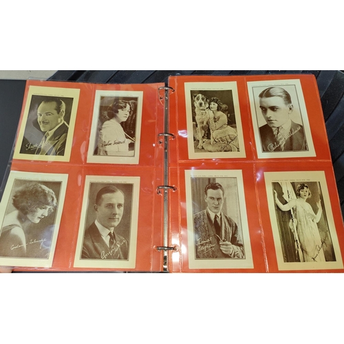 154 - An album of 1920's Girls' Cinema postcards; Picture Show 1933 blotter and folder; cards; Woman's Wee... 