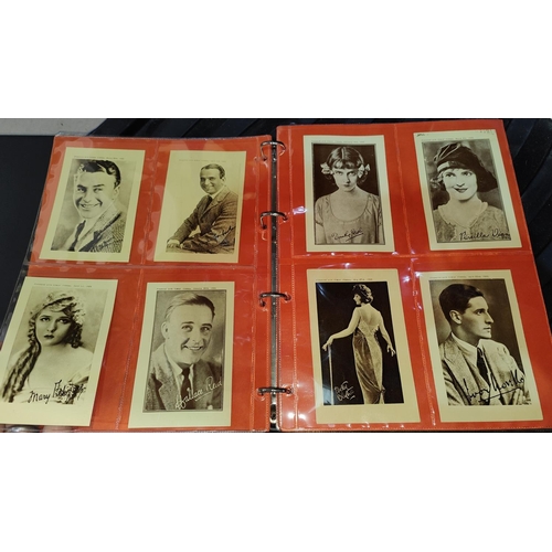 154 - An album of 1920's Girls' Cinema postcards; Picture Show 1933 blotter and folder; cards; Woman's Wee... 