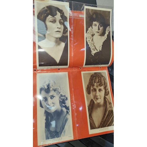 154 - An album of 1920's Girls' Cinema postcards; Picture Show 1933 blotter and folder; cards; Woman's Wee... 