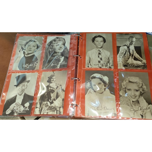 156 - An album of postcards:  Fascinating Film Stars Film Star Favourites portrait wallets; early 20t... 