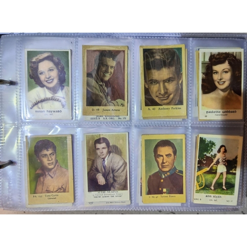 162D - An album of early 20th century film star cigarette cards, not complete sets, over 500