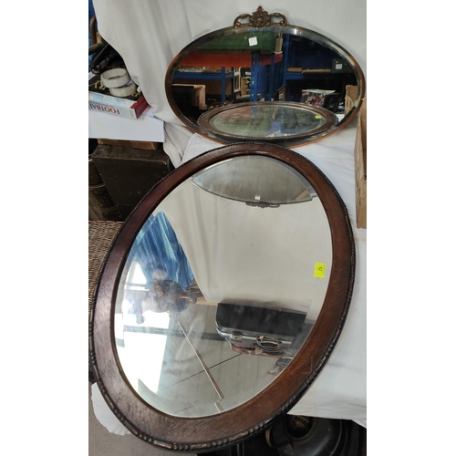 62 - A beaded oak wall mirror and a metal frame wall mirror