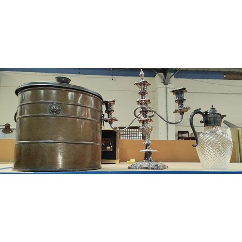 82D - A pewter and glass claret jug, a silver plated candelabra and a copper coal bucket