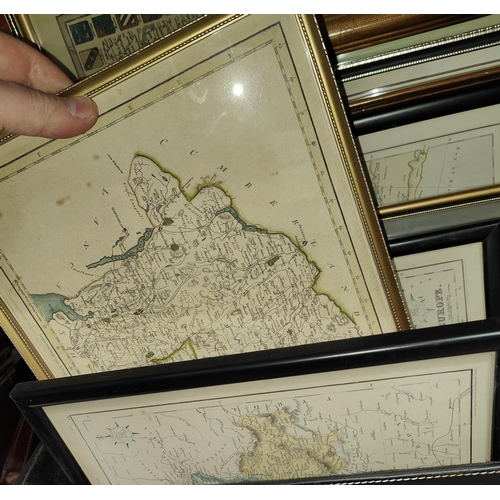 87 - A collection of framed and glazed old maps including 