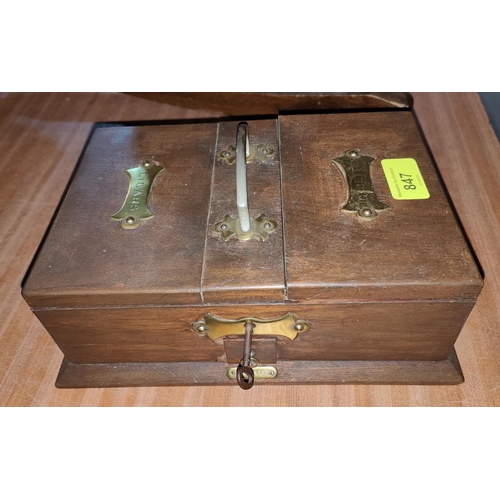 847 - A smokers cabinet with brass bindings, cigarette, cigar and lighter sections