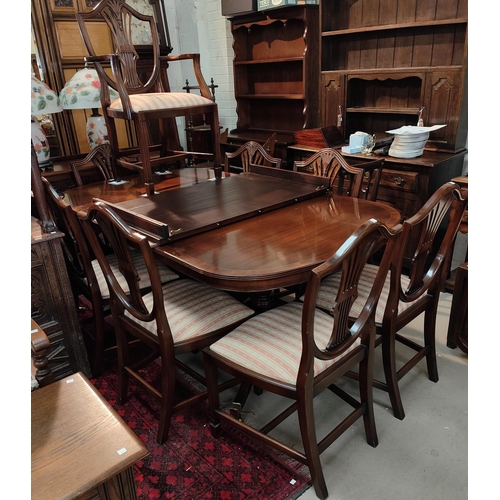 842 - A good quality mahogany Rackstraw extending 8/10 seater pedestal mahogany dining table and 8 (6 plus... 