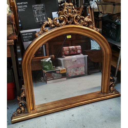 828 - A large and impressive gilt framed over mantel mirror with acanthus decoration, ht. 101 x 120cm