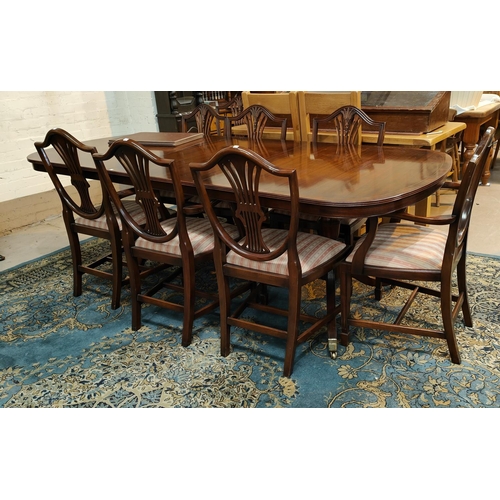 842 - A good quality mahogany Rackstraw extending 8/10 seater pedestal mahogany dining table and 8 (6 plus... 