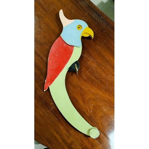 45A - A vintage wooden parrot that balances and perches 