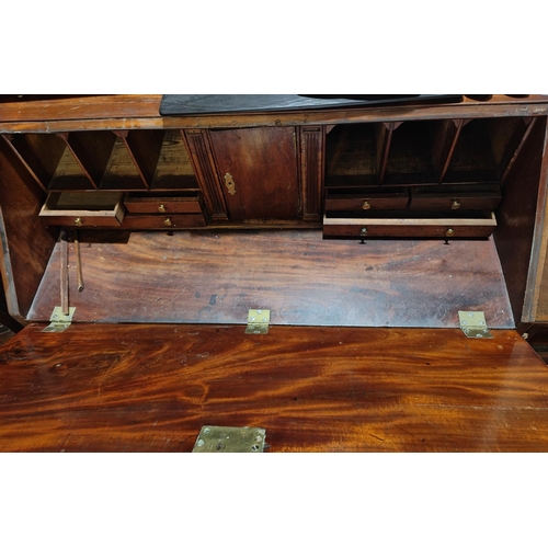 968 - A Georgian mahogany fall front bureau with tall front, fitted interior, 4 long graduating drawers wi... 