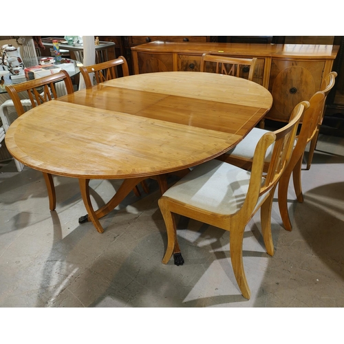 972 - A Beresford & Hicks reproduction yew wood dining suite comprising circular extending pedestal ta... 