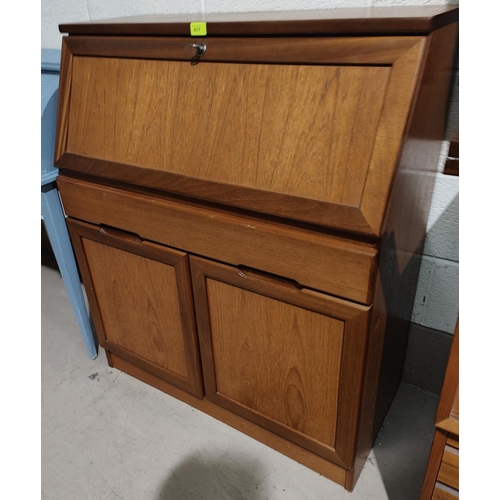 970 - A 1970's teak fall front bureau with drawer and double cupboard under