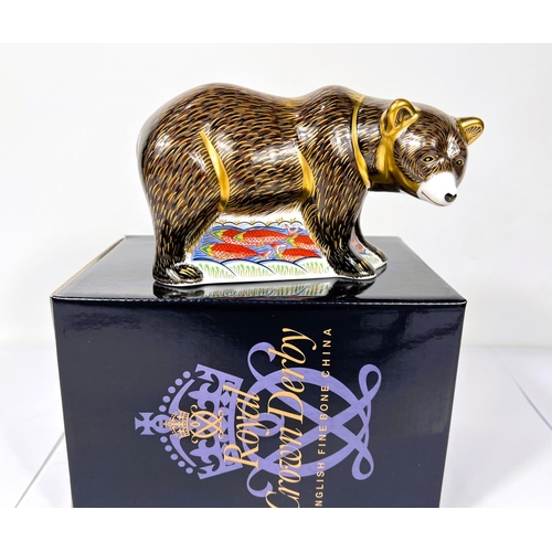 586 - A Royal Crown Derby grizzly bear MMIX, with gold back stopper and box