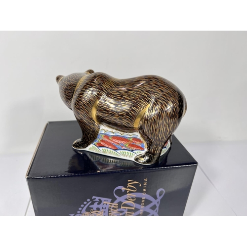 586 - A Royal Crown Derby grizzly bear MMIX, with gold back stopper and box