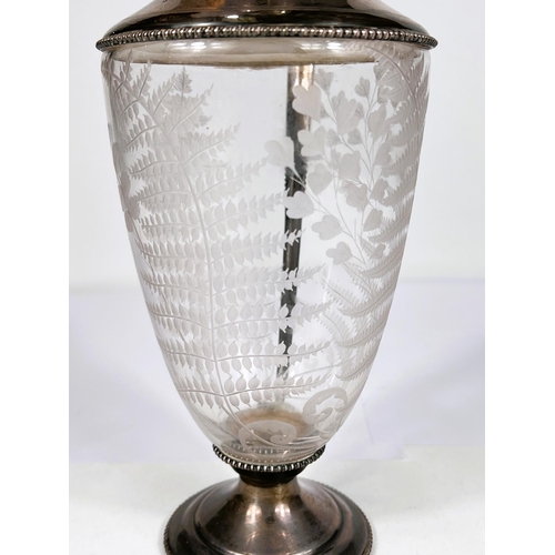 601 - A fern etched glass claret jug with beaded hallmarked silver lid, rim, handle and base