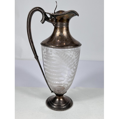 601 - A fern etched glass claret jug with beaded hallmarked silver lid, rim, handle and base