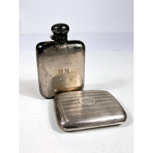 609 - A hallmarked silver hip flask, Sheffield 1943; a hallmarked silver cigar case, Chester 1924, 6.9oz