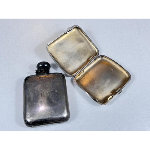 609 - A hallmarked silver hip flask, Sheffield 1943; a hallmarked silver cigar case, Chester 1924, 6.9oz