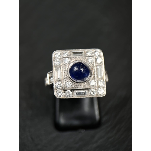 640 - A sapphire and diamond Art Deco cocktail ring with central cabochon sapphire surrounded by 16 brilli... 