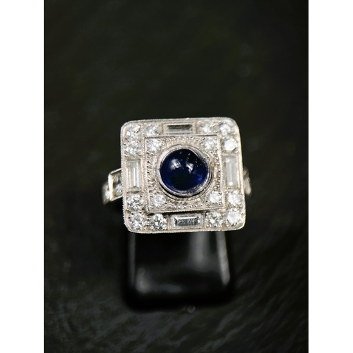 640 - A sapphire and diamond Art Deco cocktail ring with central cabochon sapphire surrounded by 16 brilli... 