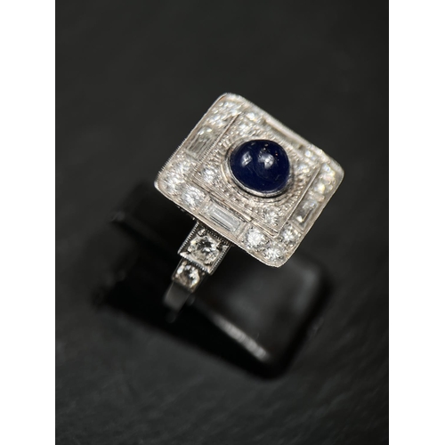 640 - A sapphire and diamond Art Deco cocktail ring with central cabochon sapphire surrounded by 16 brilli... 