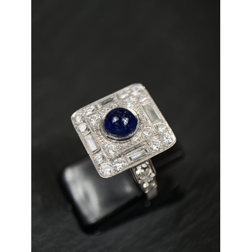 640 - A sapphire and diamond Art Deco cocktail ring with central cabochon sapphire surrounded by 16 brilli... 