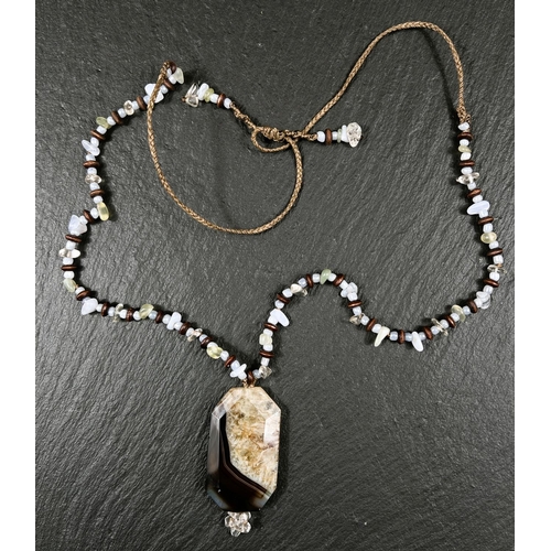 649B - A necklace formed from rough cut polished agate beads with a banded agate pendant drop similar to Bl... 