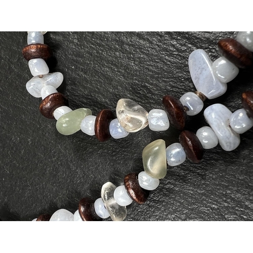 649B - A necklace formed from rough cut polished agate beads with a banded agate pendant drop similar to Bl... 