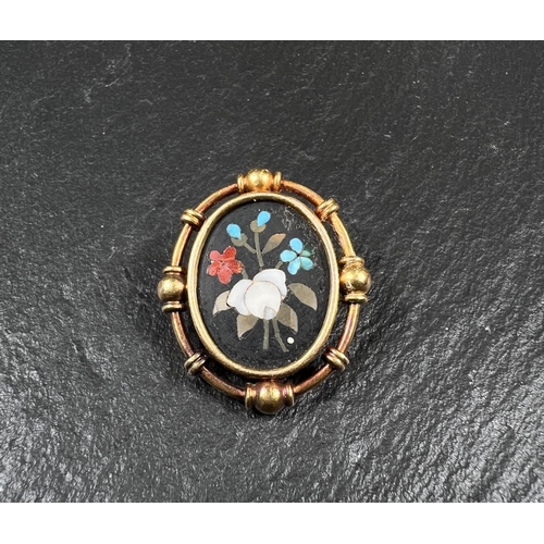 656 - A late 19th century ova Pietra Dura brooch, tests high carat, 5.3gms gross