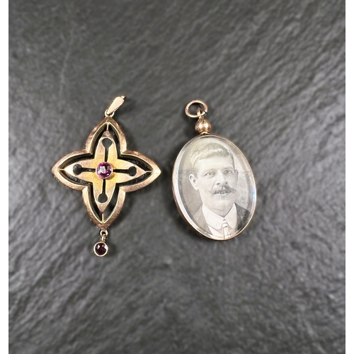 656A - An Edwardian amethyst set pendant and a double sided picture pendant, both stamped 9ct, 7.4gm gross