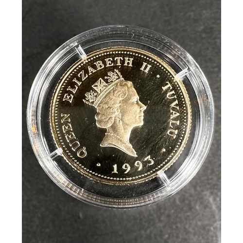 662 - A proof 1993 QEII Coronation commemorative 100 dollar coin, 585, weight 7.78gm