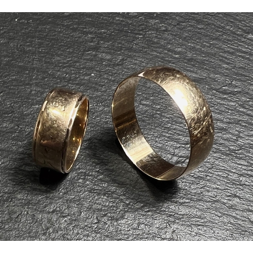 673 - A 9ct wedding band, size Z and another smaller size J, gross 8gms